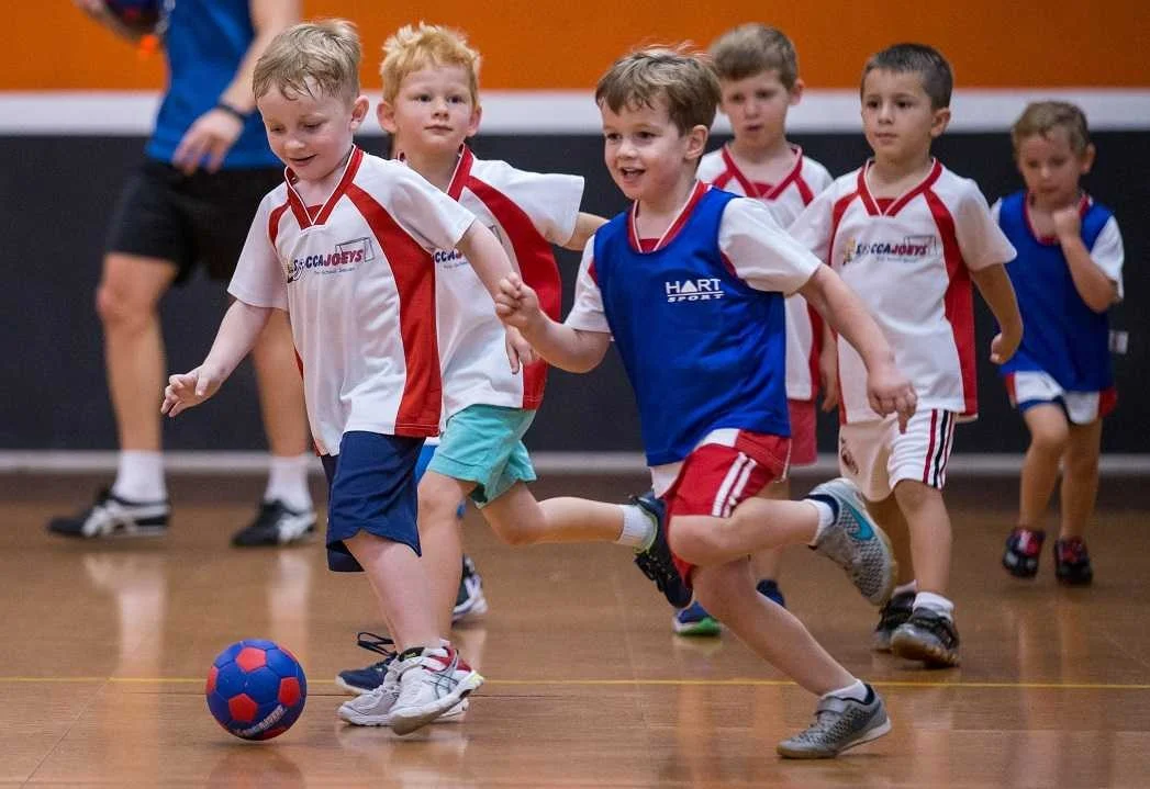 active kids playing soccer at kids sport franchise